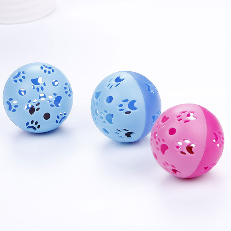 Blue and pink interactive hollow balls for cats