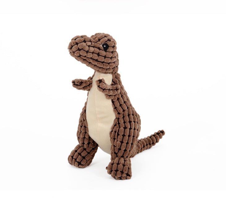 Brown dinosaur plush dog toy with textured body and cream belly