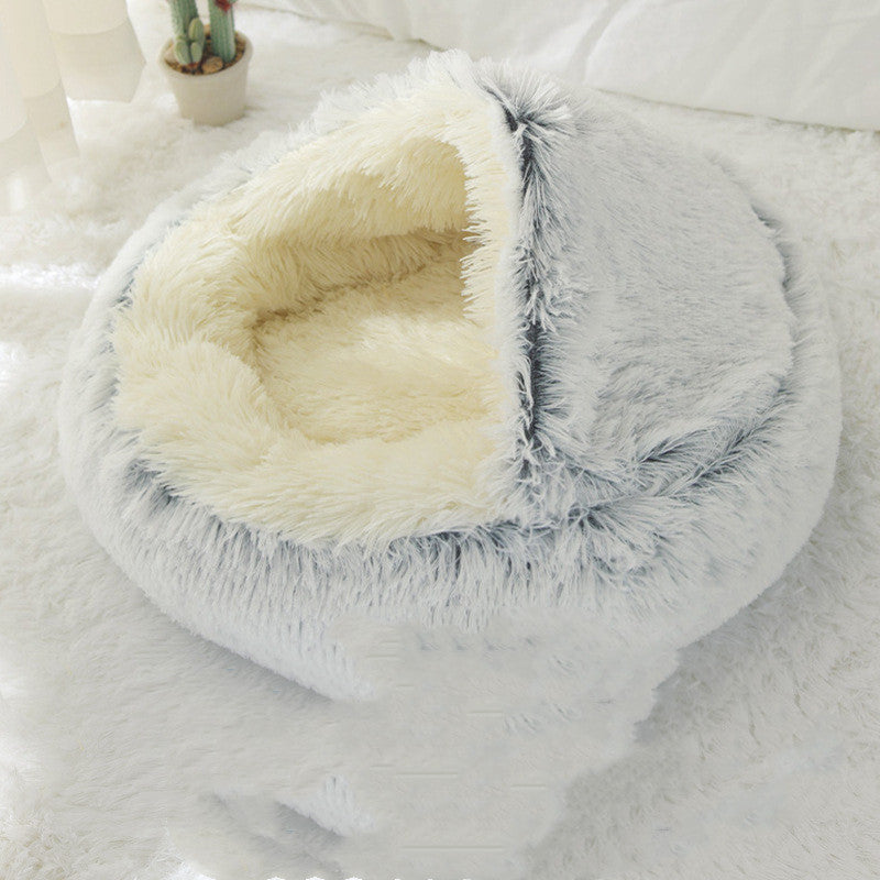Fluffy pet bed with white interior on a light gray background