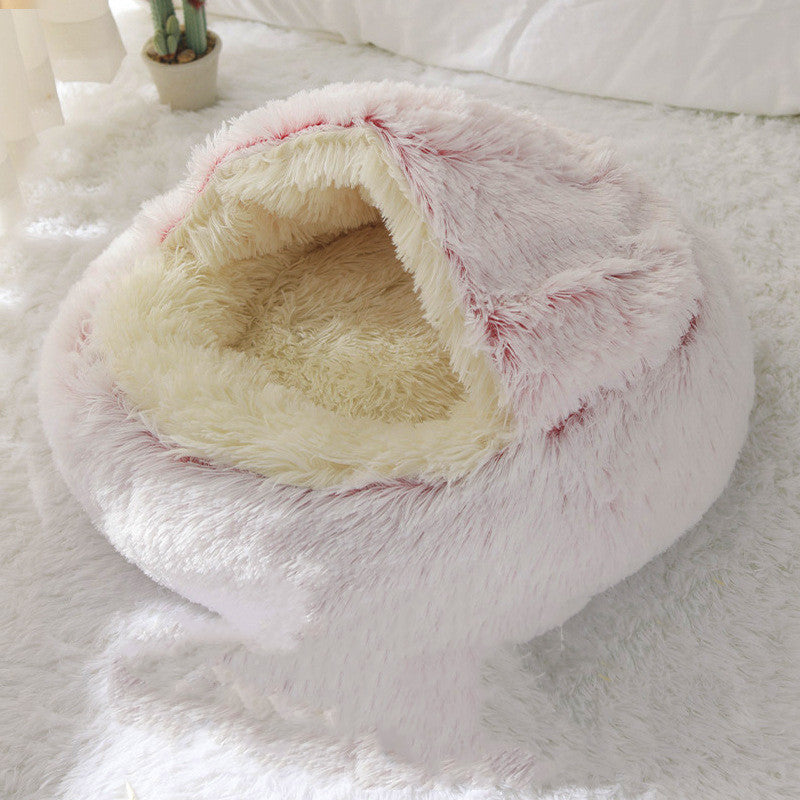 Fluffy white pet bed on a light gray surface